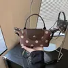 Bolso de mano patchwork de mezclilla lavada estilo americano y piel sintética, versátil para el uso diario, bolso ligero para mujer de hombro y cruzado