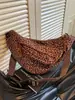 Bolsa de selim de ombro único de alta qualidade, novo modelo 2026, versátil, simples, de grande capacidade, para o dia a dia, na cor de estampa de leopardo da moda