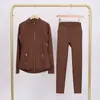 Conjunto de Chaqueta LULU DF con Cuello Alto y Pantalones Cropped con Logo, En Stock, Entrega Directa, Corte Delgado, Transpirable, Chaqueta Elástica con Cremallera Dorada