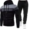 Nuevo conjunto de sudadera con capucha y cremallera de tres colores para otoño e invierno para hombre, ropa deportiva casual holgada de talla grande para hombre