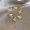 Pendientes Metálicos Largos de Encaje Mariposa con Borla de Diamantes Diseño Único Nicho Exquisitos de Moda Versátiles para Mujer