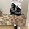 Nueva colección otoño/invierno 2026: Falda midi de corte A, holgada, estilizada y versátil, con cinturilla de color contrastante, moderna y fácil de combinar, para mujer