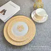 Plato de cena occidental de porcelana de hueso con borde dorado estilo europeo transfronterizo, decoración para sala de modelos, mesa de sala, plato plano de cerámica para el hogar