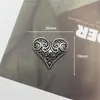 Nuevos Accesorios de Corazón Cruzado Joyería Personalizada Estilo Oscuro Parche de Aleación Hecho a Mano Accesorios para el Cabello Flores para Zapatos Materiales DIY