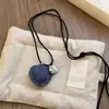 Bolsa pequena de couro fresco para óculos, cordão, colar, acessórios, alta qualidade, moda, acessórios de nicho, novas joias, atacado