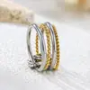 Anillo círculo de línea redonda trenzada de cuatro capas bicolor apilado con temperamento de lujo ligero Joker simple liso anillo para el dedo anular chapado en 18K