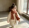 Bufanda de punto suave y versátil de color liso para niños y niñas, que realza el ambiente invernal, favorecedora para el cutis, calentador de cuello de lana para nuevos estudiantes