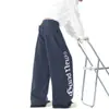 Pantalones de chándal estilo americano con estampado de letras desgastadas y pierna curva, unisex, colección de otoño, pantalones casuales rectos deconstruidos de moda, corte holgado, pantalones de pierna ancha fluidos