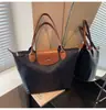 Nueva Tela Oxford Moda y Versátil Gran Capacidad Impermeable Hombro Bolso de Mano de Viaje para Mamá Señoras Nylon