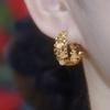 Diseño de Nicho Sentido Super Brillante Ojo de Gato Anillo Hebilla de Oreja Nuevo Caliente Otoño e Invierno Elegante Moda Combinación Perfecta Pendientes de Gama Alta