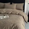 Juego de cuatro piezas de algodón 100% de color liso simple Clase A con funda nórdica de jacquard tridimensional, sábana de algodón puro, ropa de cama de alta gama para dormitorio