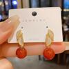 Nuevos Pendientes de Hoja Micro Incrustados Estilo Chino Sentido Avanzado Pendientes de Plata con Pin de Ágata Roja 2024 Nuevos Pendientes de Moda Populares en Internet