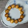 Venda por atacado direto do fabricante: Pulseiras Nan de Seda Dourada para Homens e Mulheres, Contas de Oração Budistas, Contas de Madeira Zhennan Folha Pequena, Contas de Oração, Disponível para Dropshipping