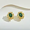 Aretes de Cristal Esmeralda con un Diseño Inspirado en Fuegos Artificiales, Presentando una Sensación Lujosa y de Alta Gama, Estilo Cielo Estrellado, Aretes de Aguja de Plata 925 al por Mayor