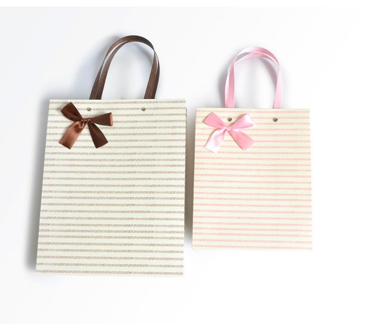 蝴蝶结手提袋_09