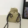 Bolso pequeño cruzado de nailon estilo japonés color liso vertical para teléfono monedero casual minimalista bolsa para auriculares bolsa de tela cruzada ins