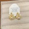 Placa de Incienso para Mosquitos Clip para Oreja Flor de Concha Pendientes de Perla Sin Agujeros en las Orejas Estilo Hada Súper Crema Pendientes de Zirconia de Alta Calidad para Mujer