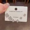 Nuevo Estilo de Primavera Exquisito y Versátil Juego de Pendientes de Tres Piezas con Flor de Cuatro Hojas de Circonita de Gama Alta, Joyería para Orejas Elegante y Simple Super Brillante