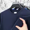 Camiseta de algodón puro de manga corta para verano para hombre, transpirable y de corte holgado, camiseta de cuello redondo para jóvenes y adultos de mediana edad, top versátil y moderno de color liso