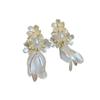 Pendientes de borlas con perlas y flores de plata con alfileres, elegantes, ligeros y de lujo, para mujer, de alta gama.