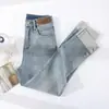 Calça Jeans de Fumaça Enrolada Feminina Nova Primavera e Outono 2025 Cintura Alta Cor Clara Reta Calça French Stick para Homens Baixos