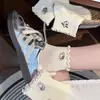 Calcetines Blancos Pequeños 2026 Nuevo Bordado de Animales de Dibujos Animados Calcetines Cortos de Moda Versátiles Borde con Volantes Calcetines Cortos Delgados para Mujer