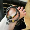 Pulseira de Obsidiana Prateada Natural com Círculos Duplos e Acessórios de Borboleta Olho de Tigre Luxo Leve Design de Nicho Joias de Mão Venda por Atacado