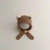 Bonitos y adorables gorros de otoño e invierno para niños, con diseño de poner, material de punto y una serie de dibujos animados, que brindan abrigo y protección para los oídos para bebés y niños pequeños.