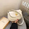Bolso popular para mujer 2023 nuevo nicho moda todo partido hombro bandolera axila bolso alta calidad retro bolso de sillín
