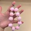 Cordão para celular Outono e inverno Bola de pelo Pingente de pulso curto Pelúcia Pingente requintado Corrente Chaveiro Shell Universal