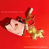 Venta al por mayor de Llavero Popular Shuibei Oro Puro 999 Nube y Caballo Colgante de Bolsa Plana Impreso Adorno de Regalo Exquisito