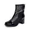 Sandalias de estilo europeo y americano para mujer 2025 primavera y verano tacón grueso negro tacón alto zapatos de moda nicho personalidad cadena hueca sandalias romanas