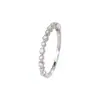 Anillo de circonita de media fila ultrafino para mujer, apilable, moderno y único, anillo irregular de diamantes pequeños, anillo de diamante redondo brillante
