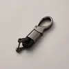 Directo de fábrica llavero de cuerda tejida accesorios de ferretería hebilla de herradura colgante para llave de coche accesorios de coche de moda