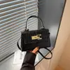 Bolso de cierre de moda de alta gama transfronterizo, bolso cruzado versátil de moda de lujo discreto, bolso de mano único con patrón de cocodrilo
