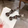 Presilha de cabelo de alta qualidade estilo coreano com laço e strass, um novo design delicado e luxuoso para mulheres, perfeita para prender franjas laterais e fios soltos