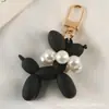 Novo Pingente Chaveiro de Carro de Cachorro com Bolhas de Pérola de Silicone Decoração Criativa de Bolsa Desenho Animado Estilo Fresco Ornamento de Mochila