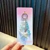 Colgante pequeño de estrella de mar para cadena de teléfono móvil, colgante de flor de lirio para bolso de estudiante, decoración de teléfono móvil, llavero, pequeño regalo al por mayor