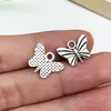 Accesorios colgantes de serie de insectos mariposa hueca de plata antigua DIY Pendientes Collar Accesorios para ropa Colgante Venta al por mayor