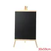 Nova lousa pequena com borda de madeira com tripé de apoio cavalete quadro de avisos