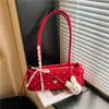 Bolsa de bolinhas de nicho, moderna e estilosa, para mulheres, novo modelo 2026, versátil para o dia a dia, bolsa de ombro, bolsa de axila, bolsa de mão, bolsa baguette