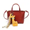 Bolso Retro de Alta Apariencia de Moda para Mujer 2026 Nueva Moda Bolso Cruzado Versátil Bolso Cubo Elegante de Nicho