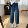 Jeans de tiro alto elásticos en cuatro direcciones con corte curvo adelgazante para mujer, pantalones balloon cropped de otoño para cuerpo tipo pera, modelo nuevo 2026