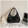 Cor Sólida Moda Casual Personalidade Tendência Cool Rebite Bolsa de Axila 2026 Verão Novo Estilo Tendência Casual Simples Bolsa de Ombro
