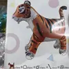 Animal de desenho animado com rodas para passear de cartão transfronteiriço Gato KT tigre estegossauro layout de aniversário balão de alumínio