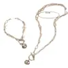 Conjunto de pulsera y collar con hebilla de campana, joyería de moda transfronteriza de Amazon, combinación de cadena geométrica