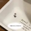 Pendientes de acero de titanio 316L brillantes mini de 4 mm con circonita de estrella para mujer, compactos de pentagrama en espiral para el lóbulo y la concha
