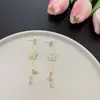 Pendientes Largos de Borla de Mariposa Dulces Estilo Francés Super Hada Personalidad Elegante Temperamento de Gama Alta Estilo Lujo Ligero Socialité