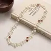 Colección Larga de Collares Superpuestos de Perlas Swarovski para Mujer, Estilo Lujo Ligero, Cadena Versátil para Suéter con un Toque de Alta Gama, Venta al por Mayor Otoño e Invierno