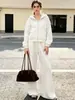 Ropa de mujer independiente transfronteriza europea y americana nueva colección 2026: Conjunto de outerwear de color liso y pantalones de pierna ancha, de alta gama, cómodo y elegante, con mangas largas